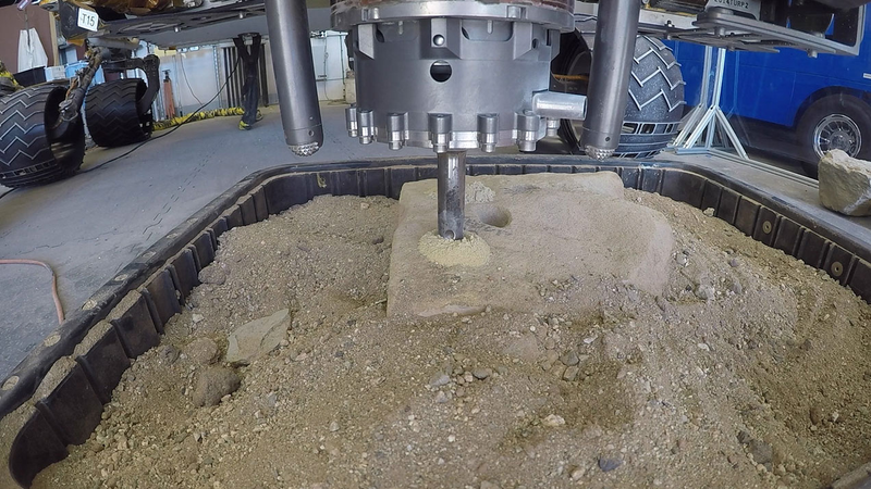 A test of the percussive drilling technique at NASA’s JPL.